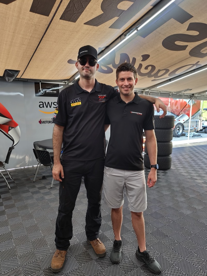 Peter with teammate in the paddock